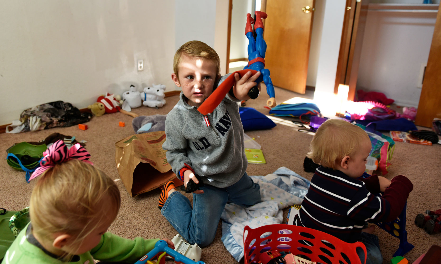 Stephanie Oakley's son, who suffers from a rare form of cancer, plays with his siblings in their new home in Oklahoma City
